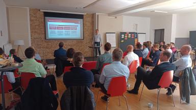 A seminar room with a group of people