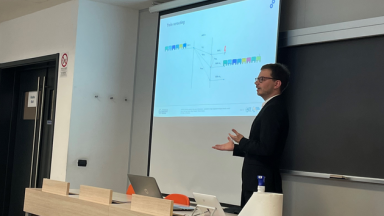 A man infront of a prensentation