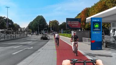 Virtuelle Welt aus Sicht eines Fahrradfahrers. Rechts ist eine PrioBike-Säule zu sehen.