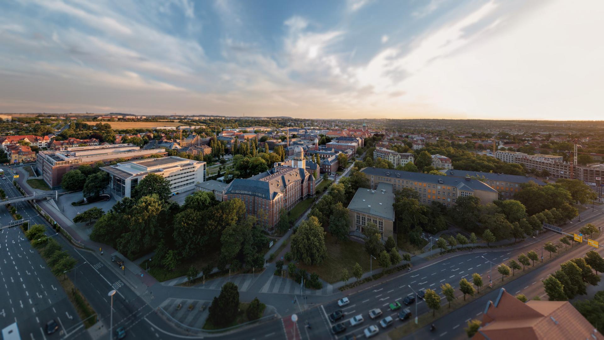 The photo shows an aerial view of some of the TU Dresden buildings. 