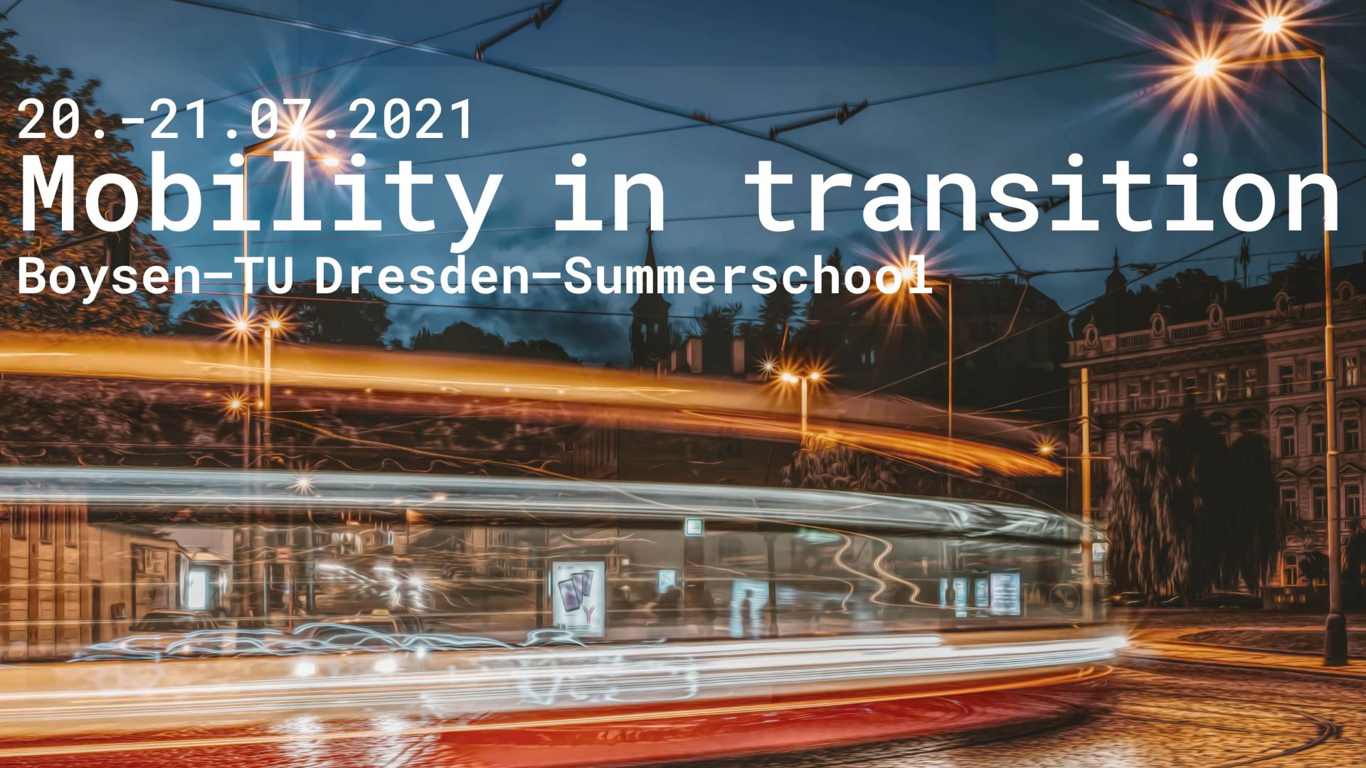 Tram runs through the city at night