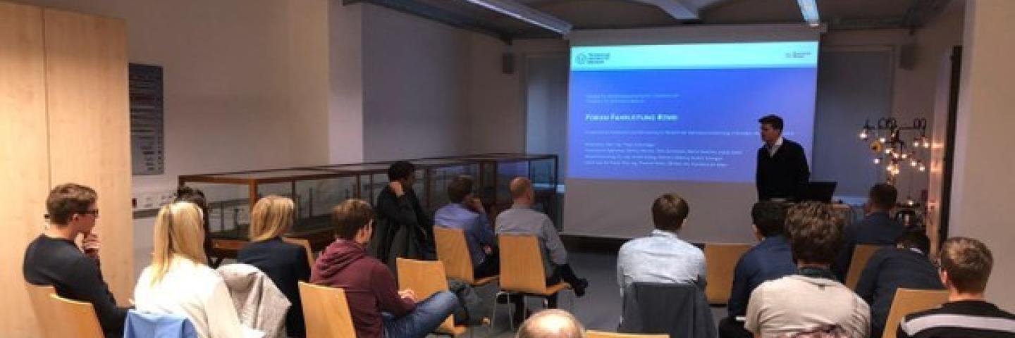 People sitting in a seminar room