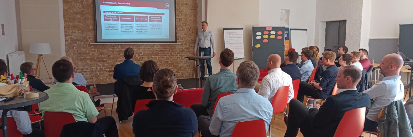A seminar room with a group of people