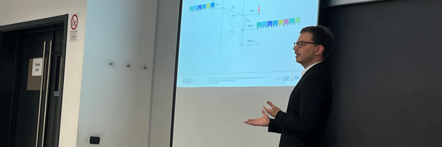 A man infront of a prensentation