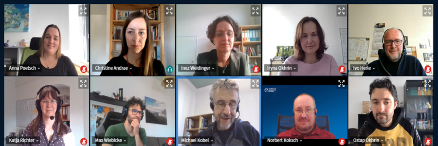 People on a screen in a video conference.