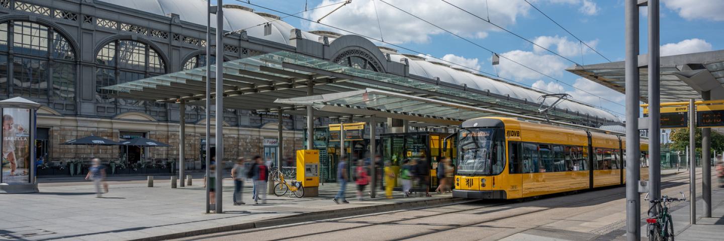 A tram stands at a stop Dresden main station