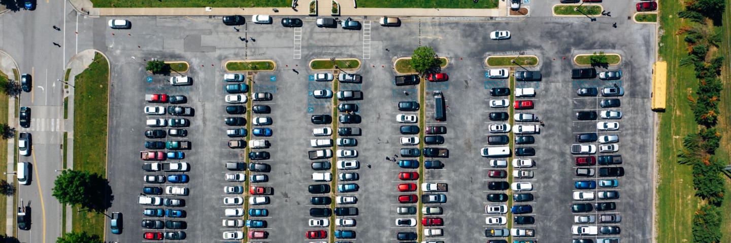 Aerial view of car park with many cars