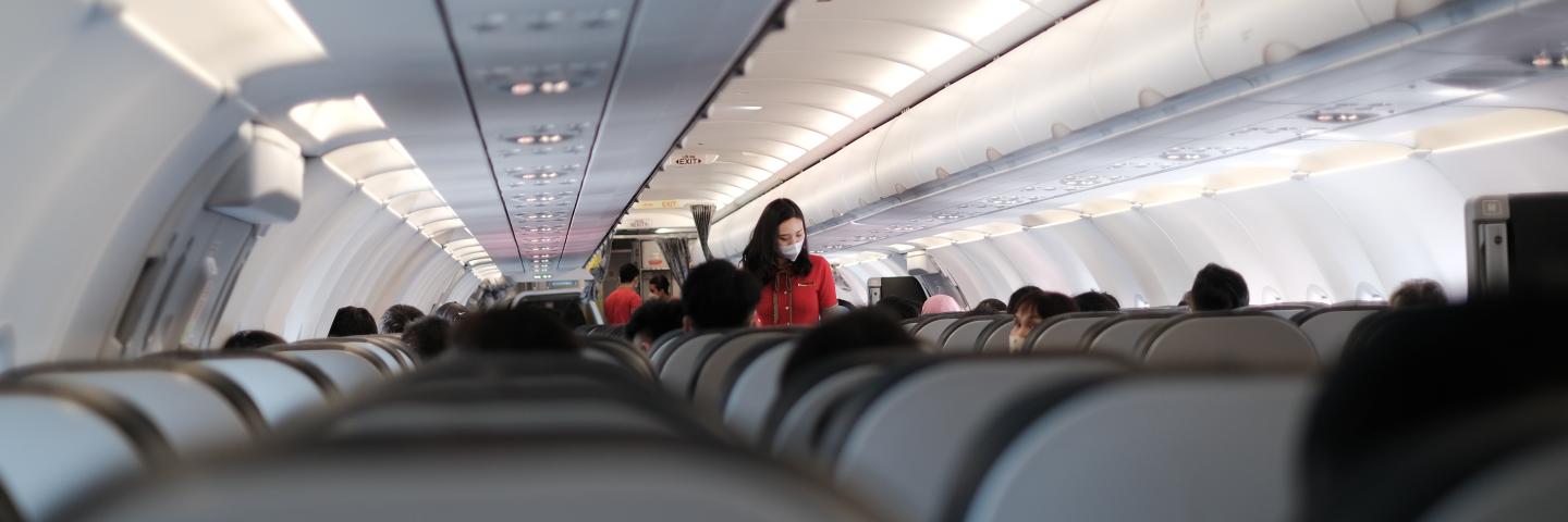 Passengers sitting in an airplane.